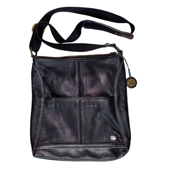 The Sak Black Genuine Leather Tassel Crossbody with Peace Print Interior - Picture 2 of 9